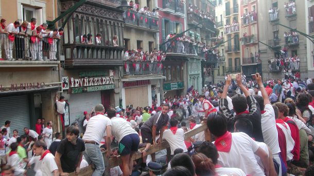 In Which Spanish City Does the Famous "Running of the Bulls" Festival Take Place Each July?